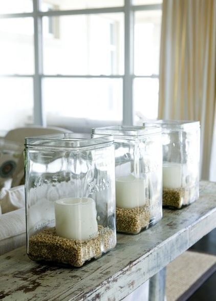 Wohnzimmer jede Jahreszeit Kaminsims  Kerzen Sand Glas Idee