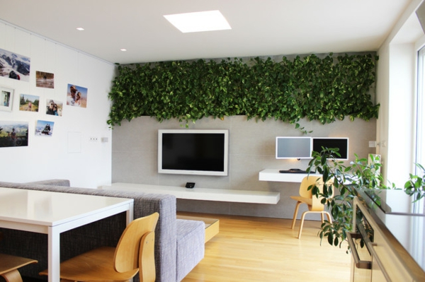 LED Lichter lebende Wand minimalistische Wohnung Slowakei pflanzen tisch couch