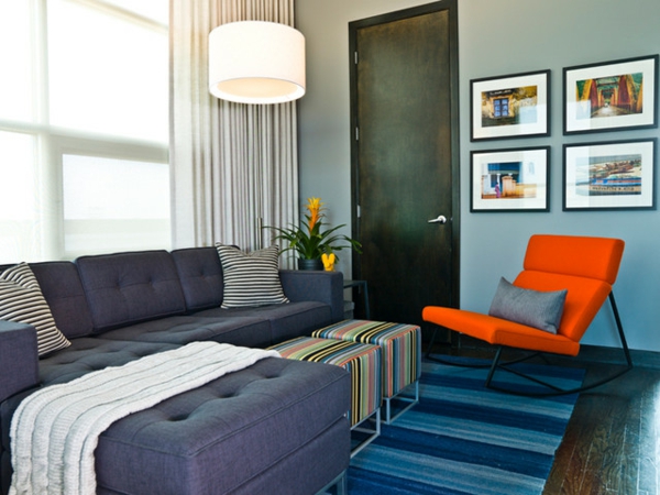 Umwandlung Autogeschäft schöne Wohnung teppich couch orange stuhl