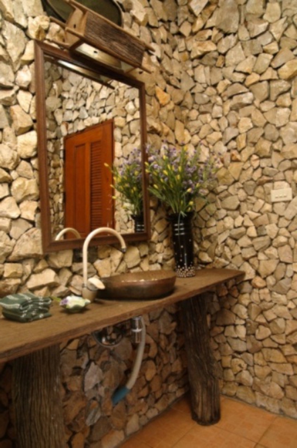 rustikale Badezimmer steine waschbecken blumen