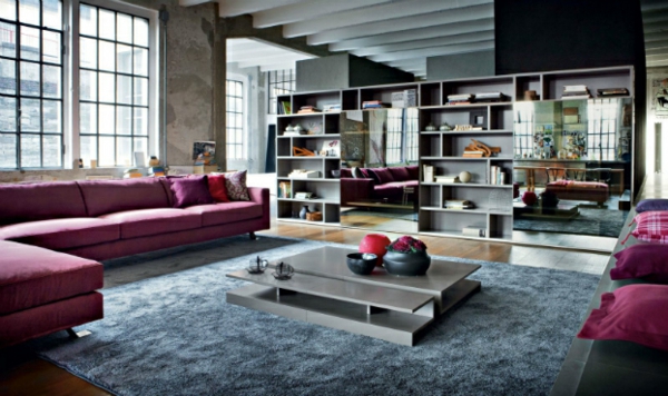 Wohnzimmer Design Idee teppich rosa couch tisch regale