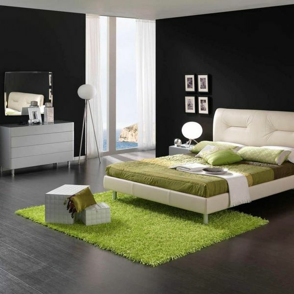 großartige schwarz-weiße Schlafzimmer bett grün teppich lampe