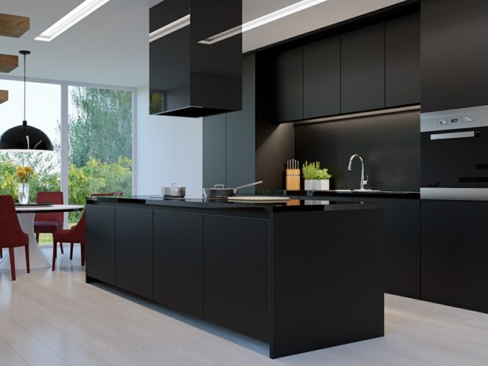 kücheneinrichtung und kücheninsel in schwarz