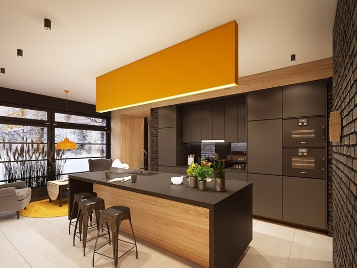 orange elemente für die schwarz eingerichtete küche