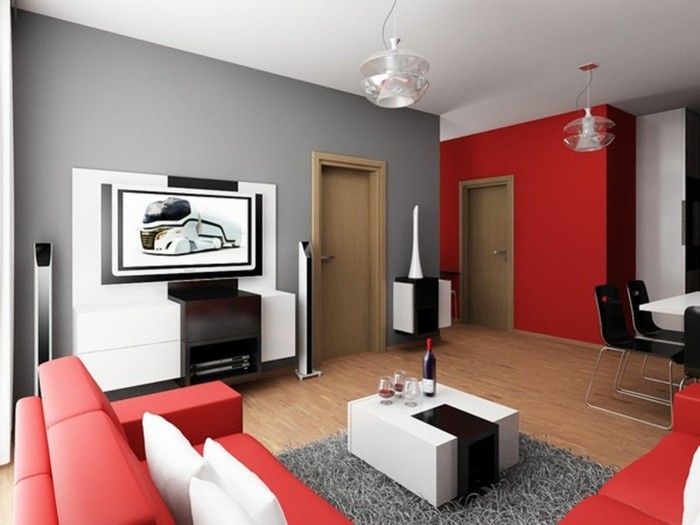 ein Wohnzimmer in grau und rot