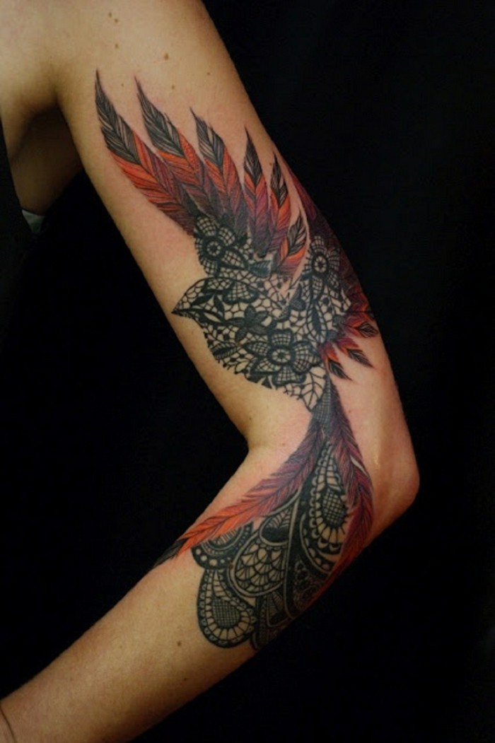 vogel und mandala tattoo in einem