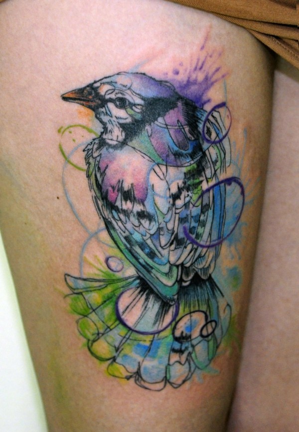 vogel tattoo am bein