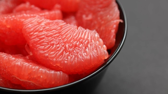 Red Grapefruit in a black bowl