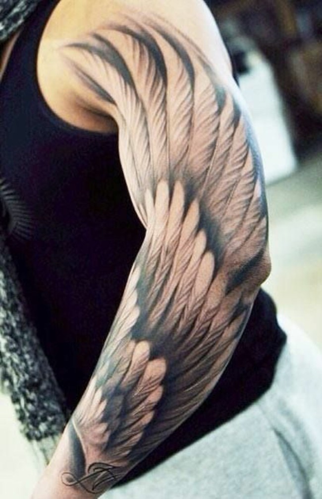 Flügel tattoo arm