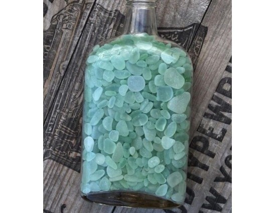 flasche mit meersteinen