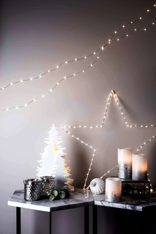 Beleuchtete Weihnachtssterne fürs Fenster lichterkette um draht basis wickeln und hinstellen