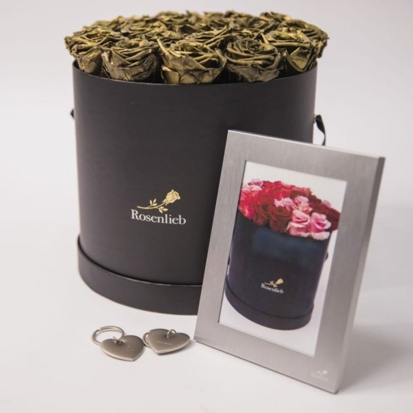 Luxuriöse wunderschöne Rosenbox mit goldenen rosen bilderrahmen und herzenanhänger
