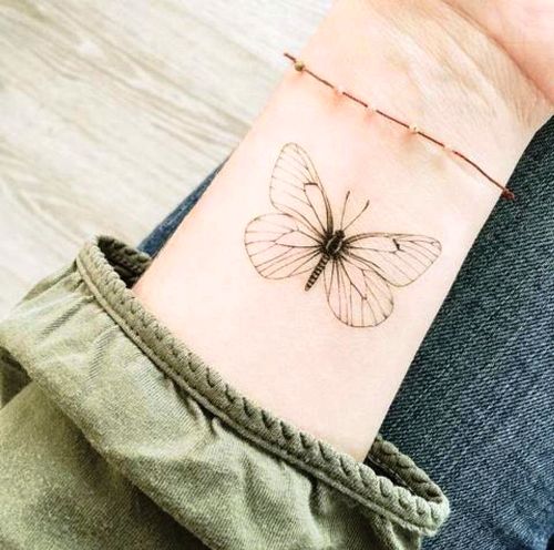 Handgelenk Tattoo Ideen weißer schmetterling