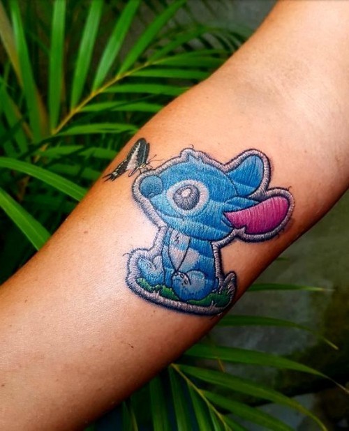 60 wunderschöne Kreuzstich Tattoos zum Inspirieren lilo und stitch monster und schmetterling