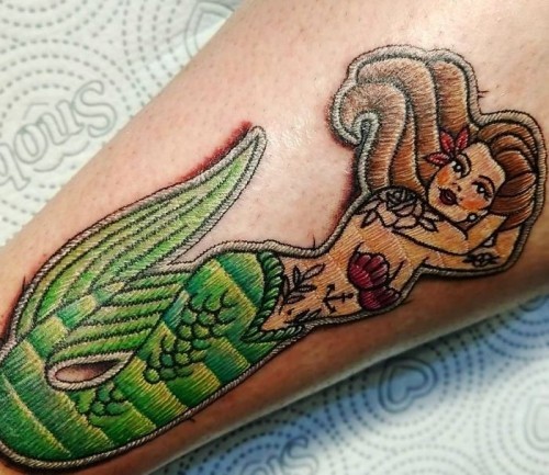 60 wunderschöne Kreuzstich Tattoos zum Inspirieren meerjungfrau typisch männliches motiv