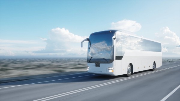 tourist white bus on the road, highway. Very fast driving. Touristic and travel concept. 3d rendering.