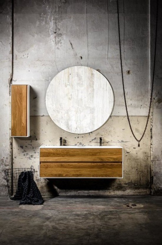 Badezimmer umbauen - Diese wesentlichen Möbel dürfen nicht fehlen Unterschrank Waschbecken mit runden Spiegel