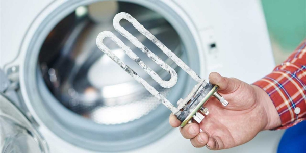 Vorteile vom Einbau einer Entkalkungsanlage bei Neubauten waschmaschine mit kalkstein spuren