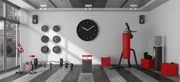 Fitnessraum einrichten – Ideen und Tipps für effektives Training rot und grau fitness studio modern
