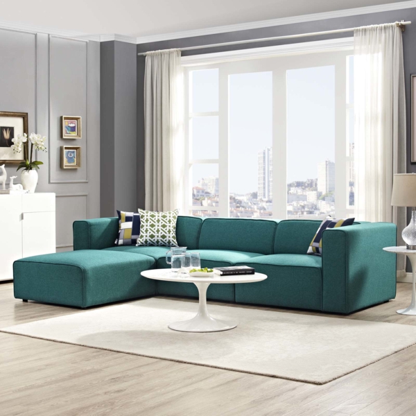 wohnzimmer farben ideen grünes sofa weißer teppich