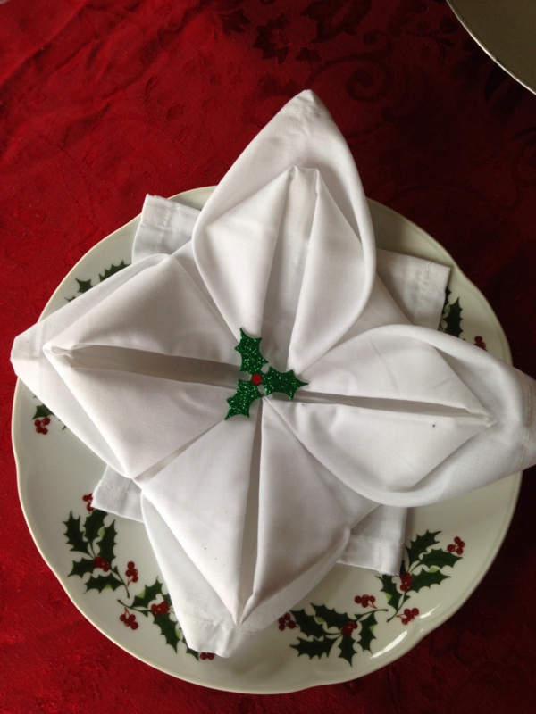servietten weihnachtlich falten schneeflöckchen weihnachtliche tischdeko